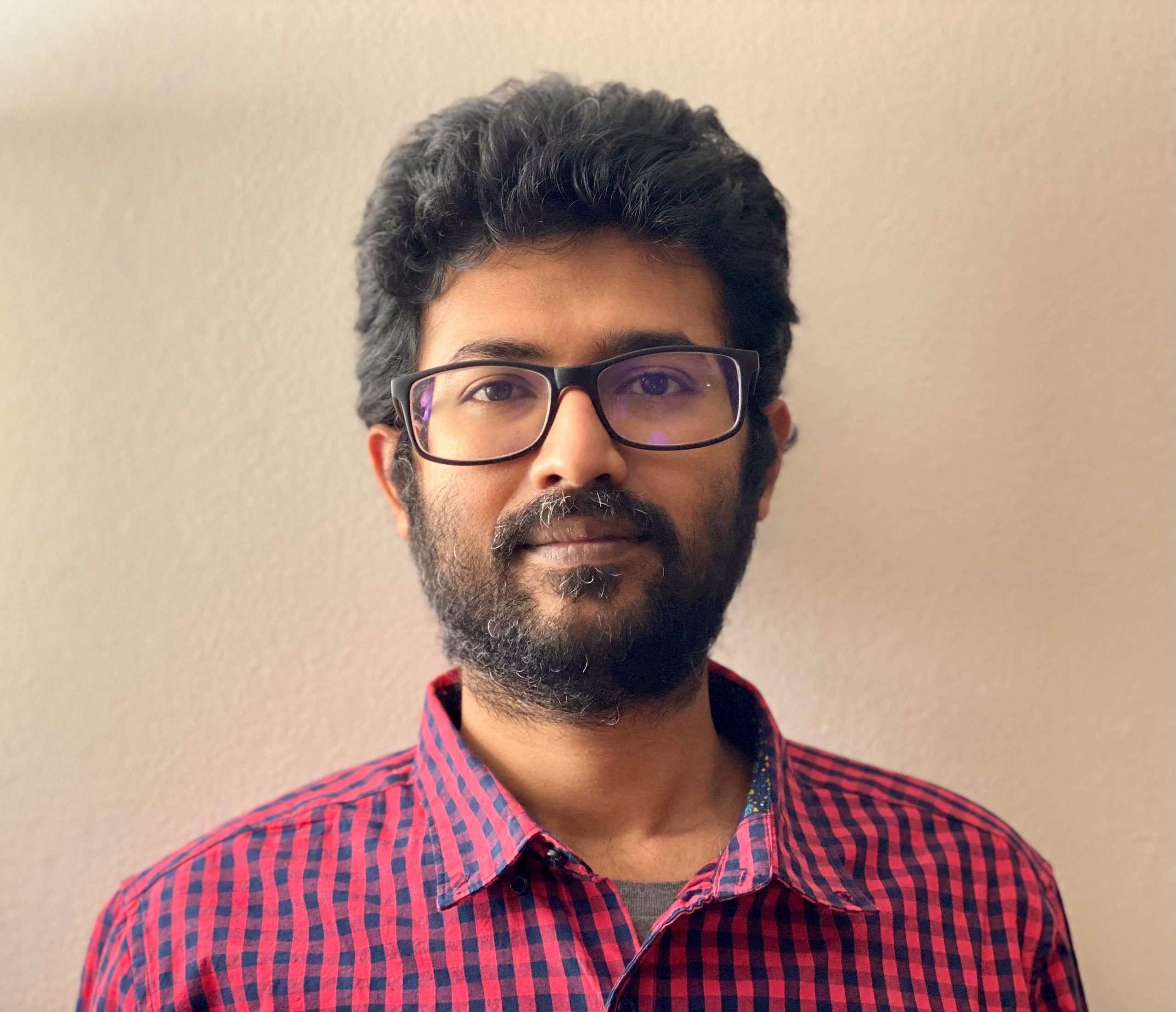 A headshot of Khalid Hossain