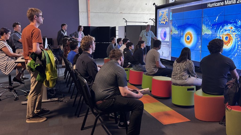 An image of ATPESC attendees at the Argonne VisLab